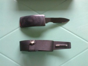 buckle knife and a belt
